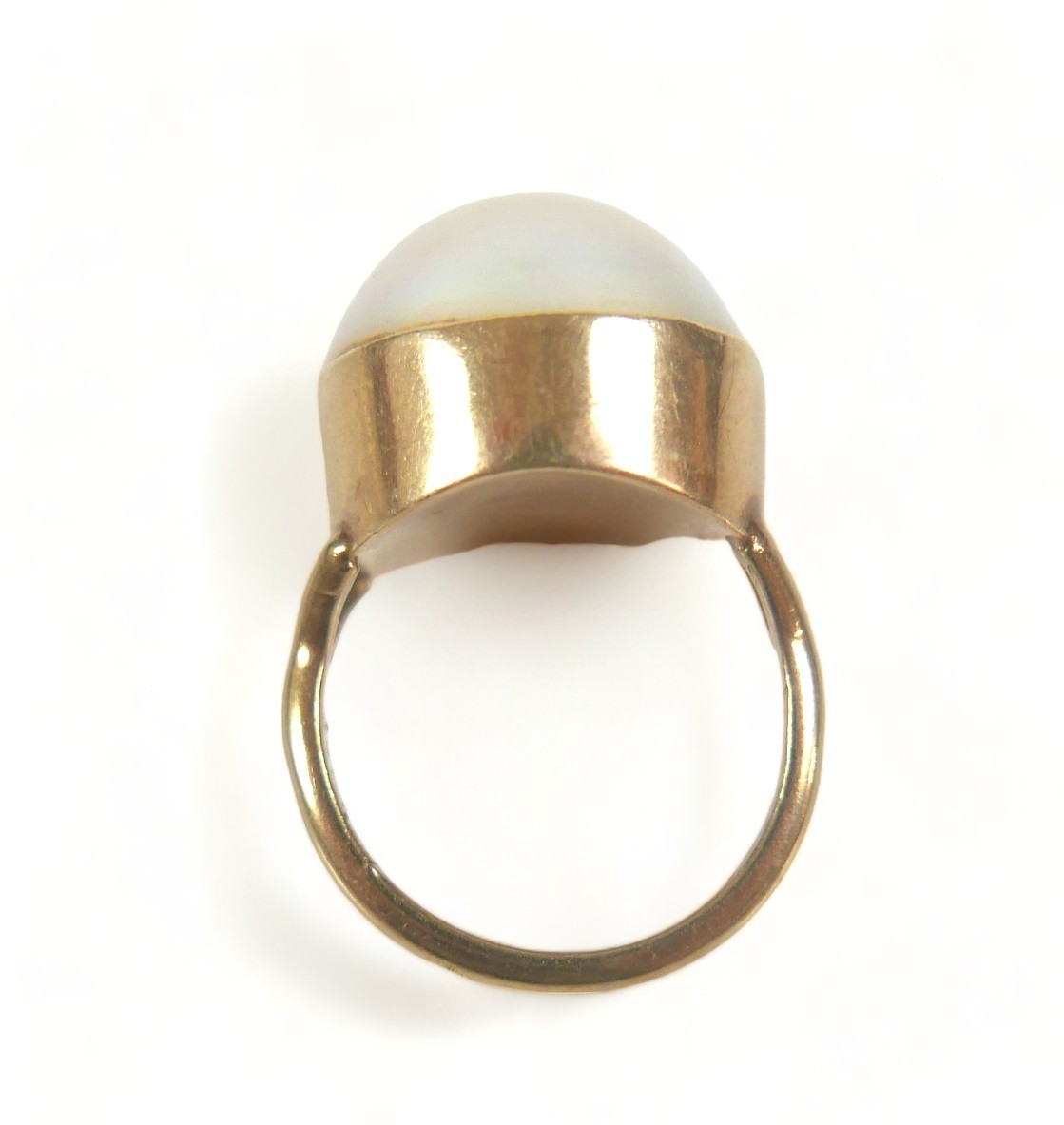 A 9ct gold ring set with a large cabochon pearl, approximately 15 mm diameter, size K, 6.9g. - Image 4 of 5