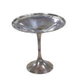 An American silver tazza, with pierced decoration to its top rim, raised upon a circular base