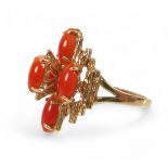 A 14ct yellow gold coral ring, size M, head size 14 by 11 by 22mm, 5.6g