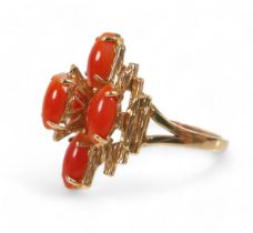 A 14ct yellow gold coral ring, size M, head size 14 by 11 by 22mm, 5.6g