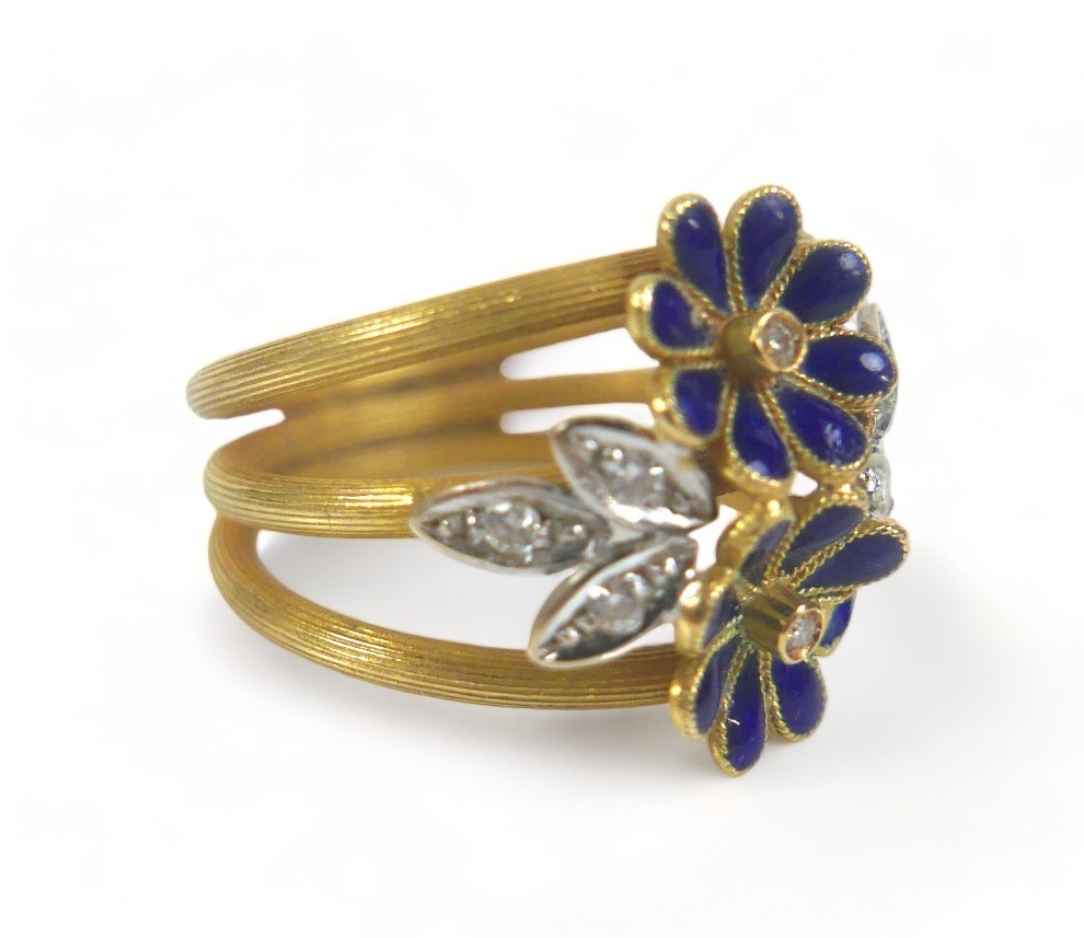 A diamond and enamel flower head ring, with eight small diamonds, the band stamped '750', size M, - Image 2 of 6