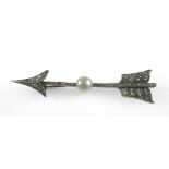 A 19th century bar brooch set with diamond chips and single pearl, modelled as an arrow, unmarked