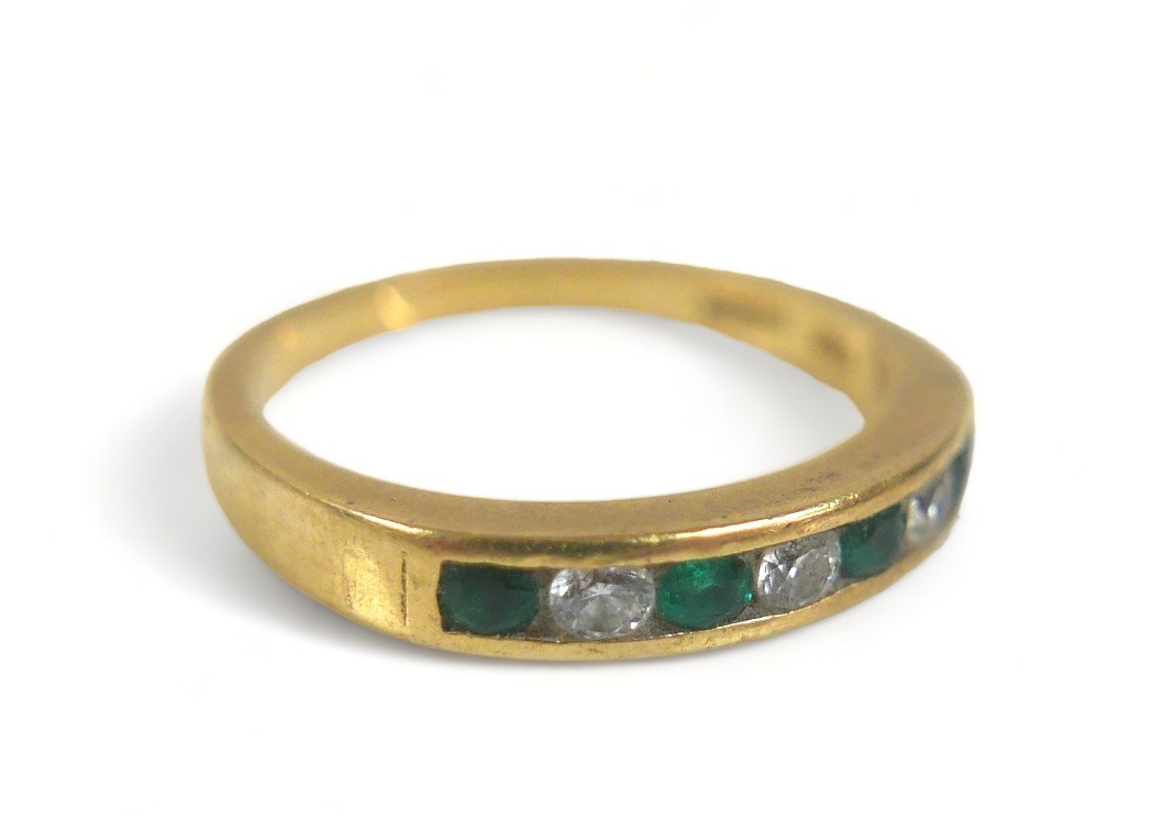 A seven-stone emerald and diamond ring, comprising three diamonds and four emeralds on 750 / 18ct - Image 2 of 4