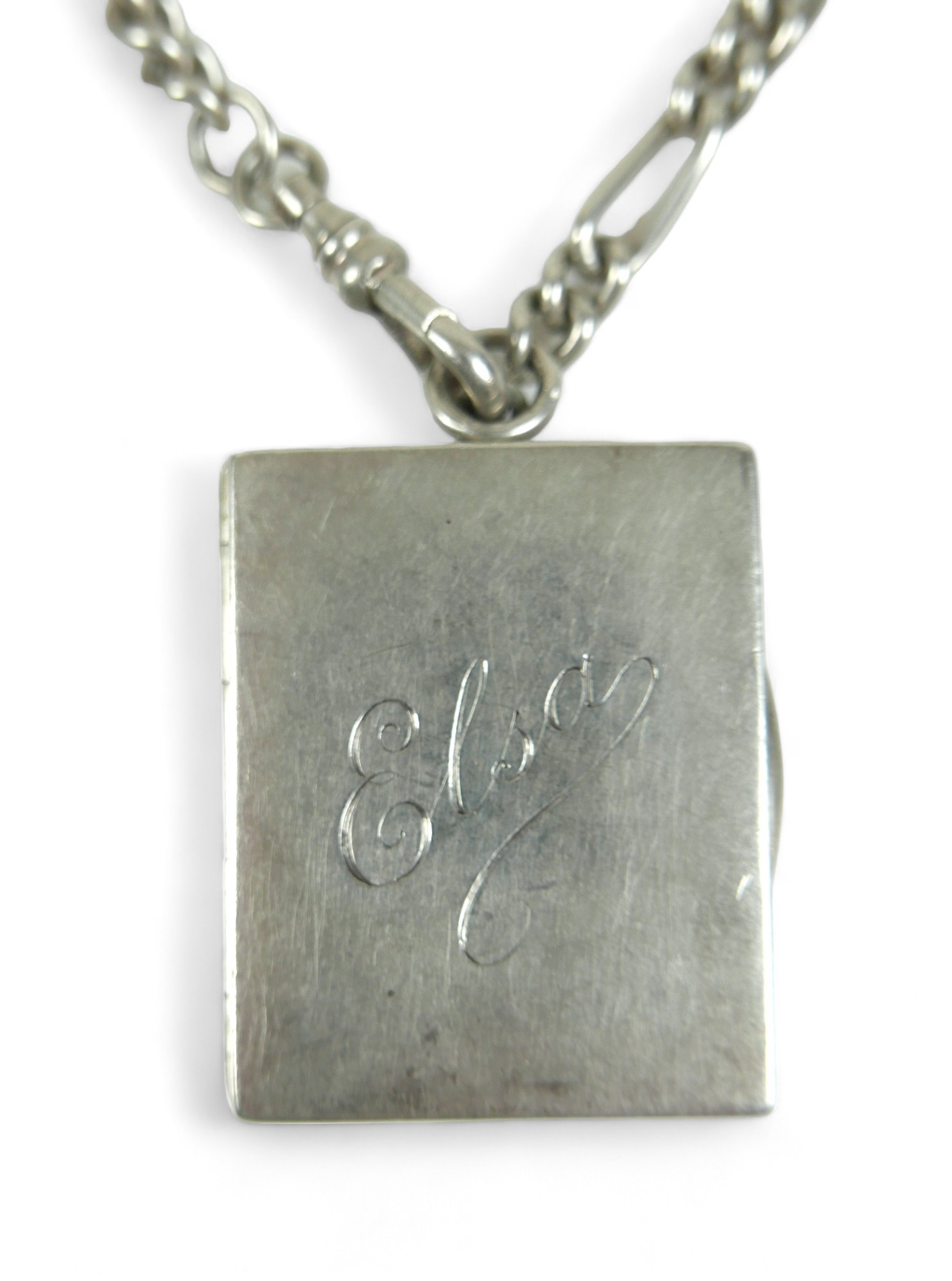 A silver watch chain necklace with white metal vinaigrette with 'Elsa' engraved, chain length