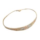 A 9ct tri-gold flat weave bracelet, 5.2g, 18.5cm long.