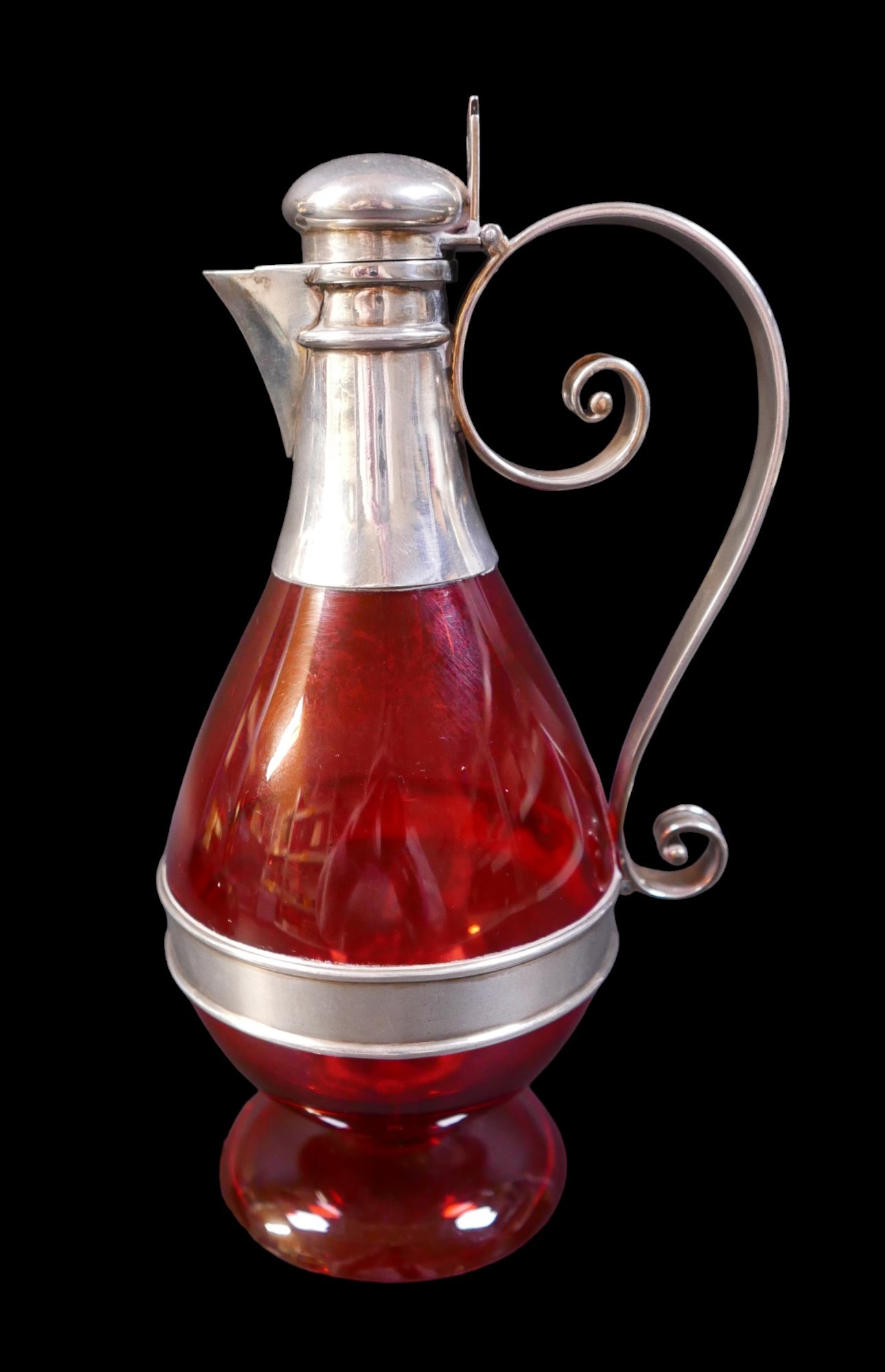 A Victorian silver-mounted cranberry glass jug for claret / ecclesiastical use with Maltese cross