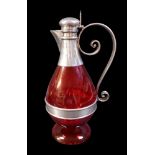 A Victorian silver-mounted cranberry glass jug for claret / ecclesiastical use with Maltese cross