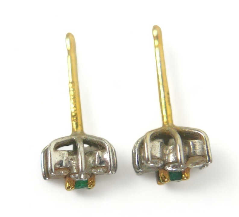 A pair of diamond and emerald flowerhead earrings, each comprising eight brilliant cut diamonds - Image 3 of 4