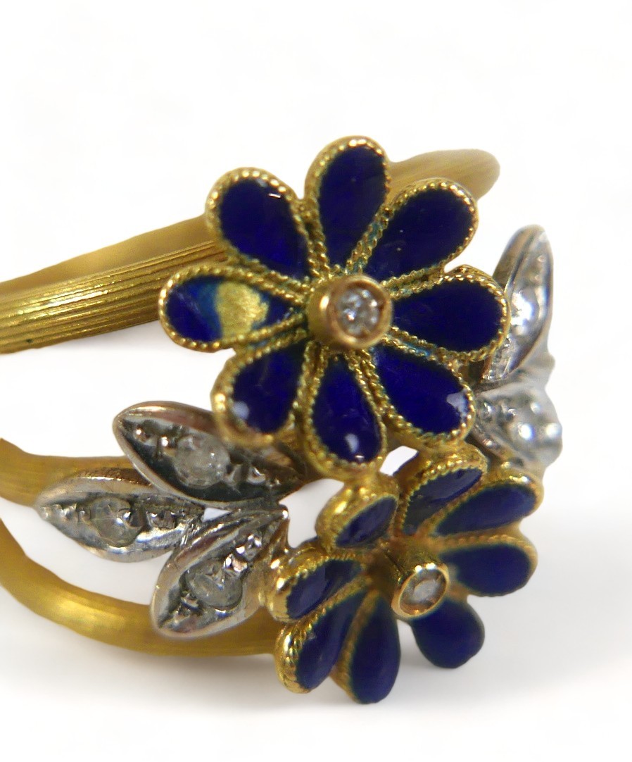 A diamond and enamel flower head ring, with eight small diamonds, the band stamped '750', size M, - Image 5 of 6