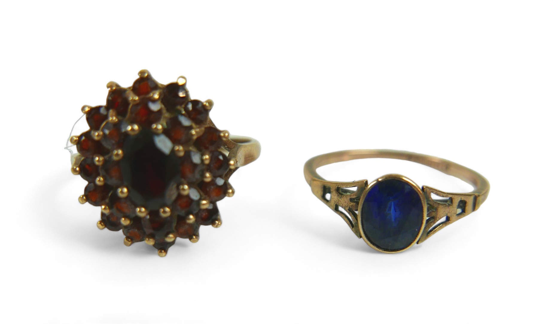 Two 9ct gold ladies dress rings, comprising an Art & Craft style sapphire ring, the stone