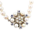 A pearl necklace with 9ct white gold and blue sapphire clasp, largest pearl, 8mm, smallest 5mm, 25g,