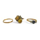 A group of three gold rings, including a 9ct gold ring set with two yellow pear-shaped stones, 2.9g,