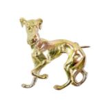 A 9ct yellow gold brooch, in the form of an Italian greyhound, PJCLd, London 1992, 22 by 22mm, 6.9g.