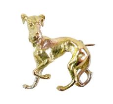 A 9ct yellow gold brooch, in the form of an Italian greyhound, PJCLd, London 1992, 22 by 22mm, 6.9g.
