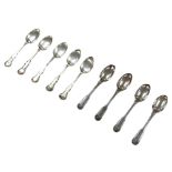 A collection of George III and later silver teaspoons, comprising four George III fiddleback pattern