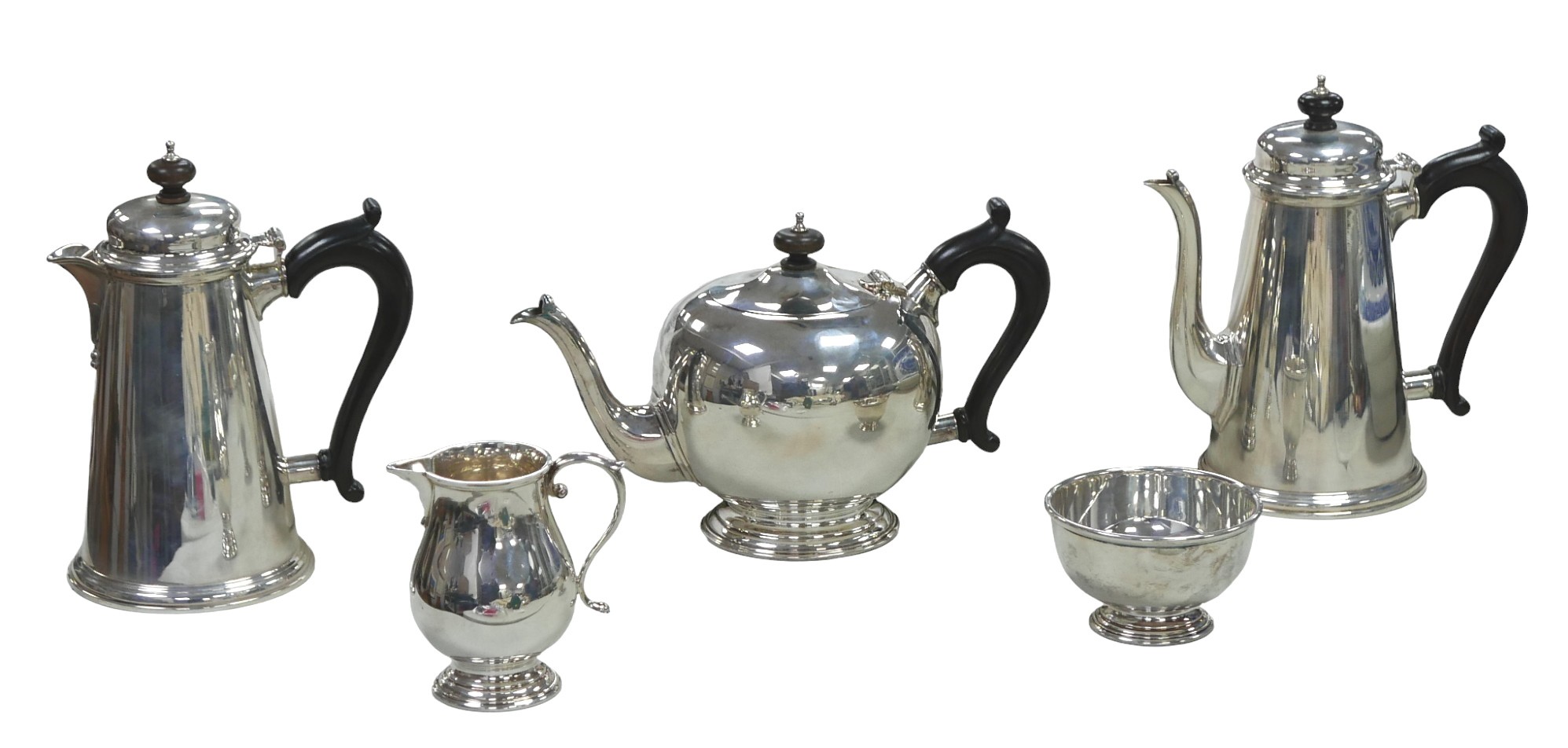 An ERII five-piece Britannia silver tea and coffee set, comprising tea pot, 16.5cm high, coffee pot,