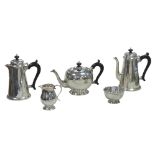 An ERII five-piece Britannia silver tea and coffee set, comprising tea pot, 16.5cm high, coffee pot,