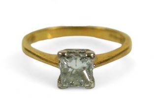 An 18ct yellow gold and diamond solitaire ring, the single princess-cut square stone approx. 0.