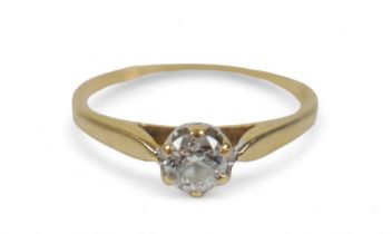 An 18ct yellow gold solitaire diamond ring, the diamond 0.30ct G/VSI. Ring size Q, 2.3 grams. with