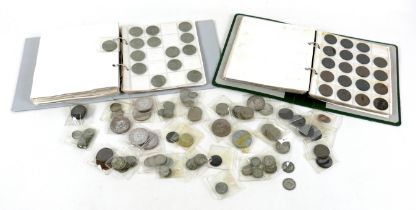A collection of mainly English coins including some silver coins, in two albums and loose.