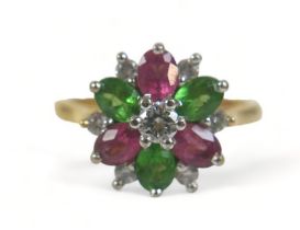 An 18ct gold, diamond and tourmaline thirteen-stone flowerhead cluster ring, the central brilliant