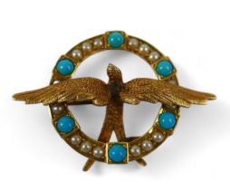 An Edwardian 15ct yellow gold, turquoise and pearl set brooch, formed as a swallow surrounded by a