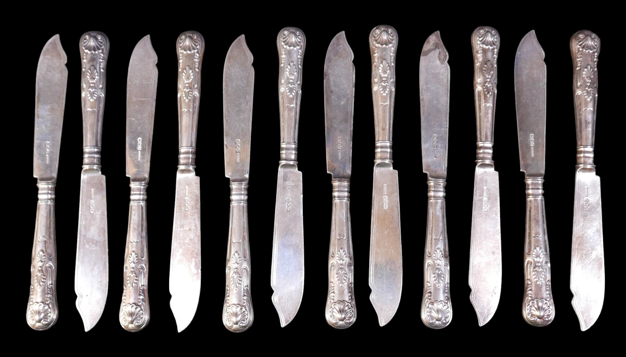 A set of twelve silver fish knives, Henry Birks & Sons Ltd, Sheffield 1956, total gross weight 22.