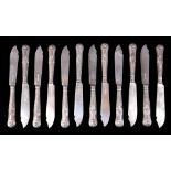 A set of twelve silver fish knives, Henry Birks & Sons Ltd, Sheffield 1956, total gross weight 22.