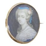 A 19th century portrait miniature of a lady, hand painted on ivory