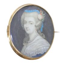 A 19th century portrait miniature of a lady, hand painted on ivory
