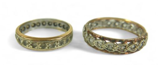 A 9ct gold bi-colour ring set with heart shaped central band and clear stones, marked 375, Size R,