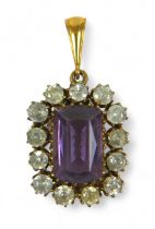 An amethyst and gold-set pendant with white stone border emerald-cut amethyst, testing as 9ct gold
