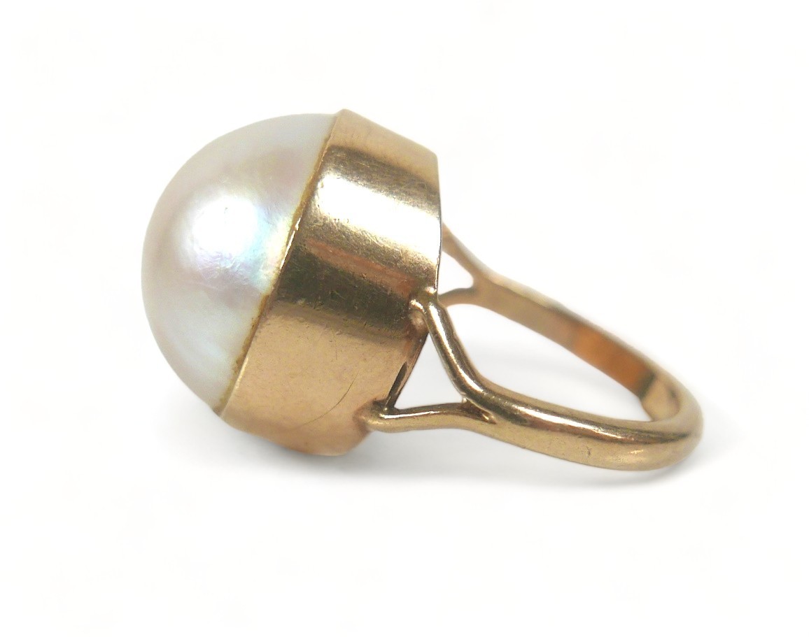 A 9ct gold ring set with a large cabochon pearl, approximately 15 mm diameter, size K, 6.9g. - Image 3 of 5