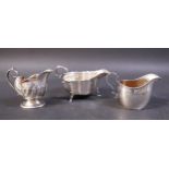 Three small silver jugs, comprising Mappin and Webb jug with three pad feet, Sheffield 1951, a small