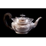 An Edwardian silver tea pot, with ebony finial and handle, Jenkins & Timm, Sheffield, 1901, 17.
