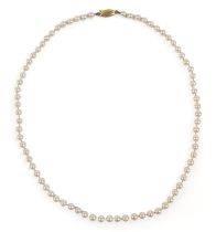 A pearl necklace, with 9ct gold clasp, single string of individually knotted evenly sized pearls,