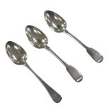 Three George III and later silver table spoons, comprising an old English pattern spoon, monogram to