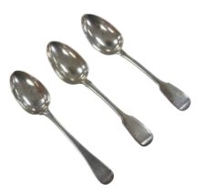 Three George III and later silver table spoons, comprising an old English pattern spoon, monogram to