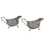 Two ERII silver sauce boats, Garrard & Co. Ltd. London, 1965, 12toz, 18 by 9 by 9cm high. (2)