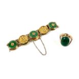 A Chinese 18ct yellow gold and jade set bracelet, formed of circular panels decorated with Chinese