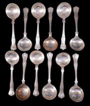 Twelve deep bowl silver soup spoons, Queens pattern with anthemion detail, Henry Birks & Sons Ltd,