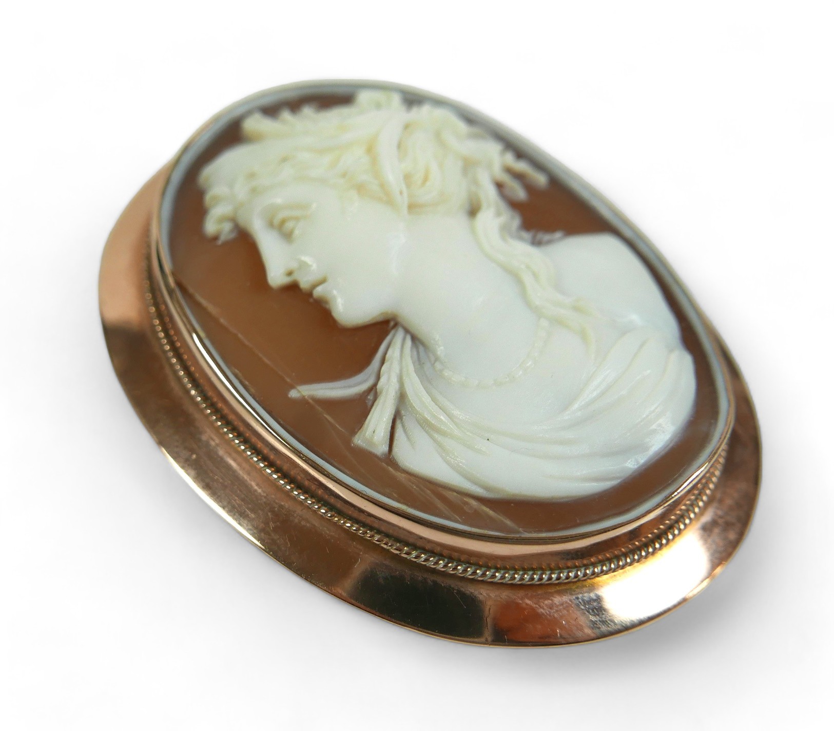 A 9ct yellow gold cameo brooch, gross weight 13.2 grams, 42 by 13 by 53mm. Cracks to cameo. - Image 2 of 5