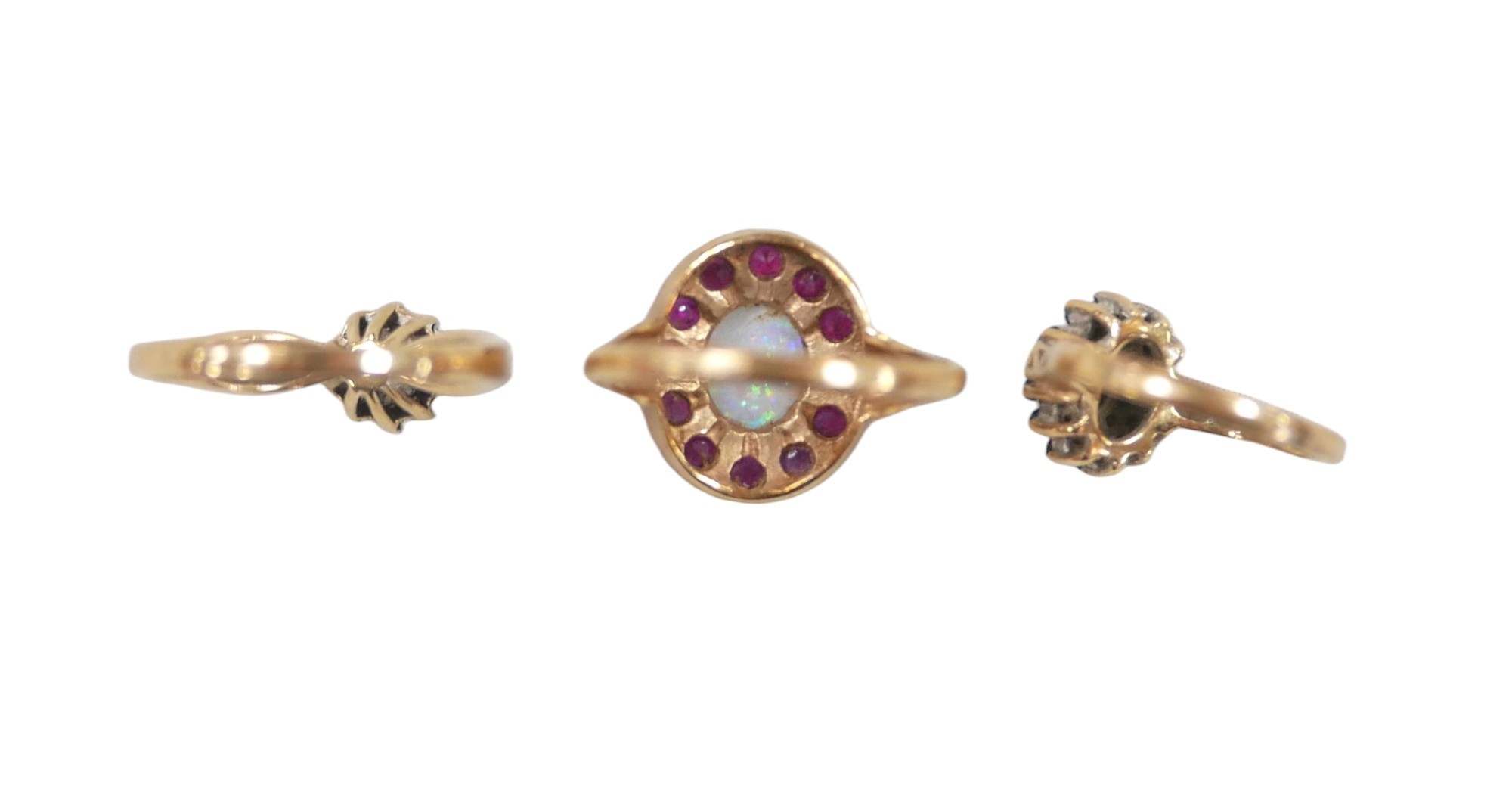 Three 9ct gold dress rings, comprising an opal and ruby daisy ring, the central oval opal 8 by - Image 3 of 3