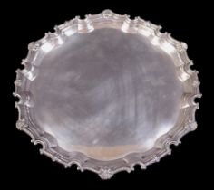 An Elizabeth ll silver salver with cast applied scroll and shell border, C.G.V. Ltd., London 1969/