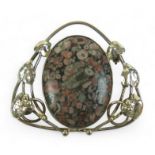 A silver Art Nouveau style pendant with hardstone central oval in pink, grey and white, with heart-