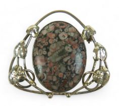 A silver Art Nouveau style pendant with hardstone central oval in pink, grey and white, with heart-