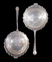 A pair of silver tea strainers, Josiah Williams & Co (David Landsborough Fullerton), London 1931,