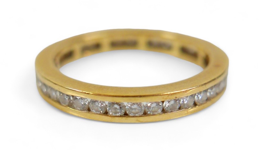 An 18ct yellow gold diamond eternity ring, total 1.00ct G/VS, 3.3mm wide, size R, 4.6g, with C.O.A.,