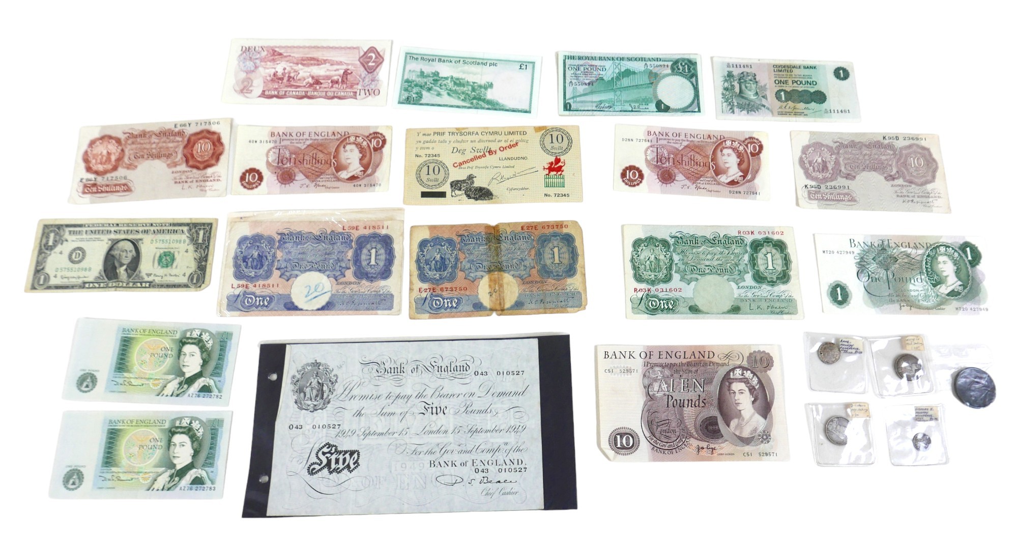 A group of notes and coins, comprising a white £5 note Beale Chief Cashier, 043 010527, dated 15th