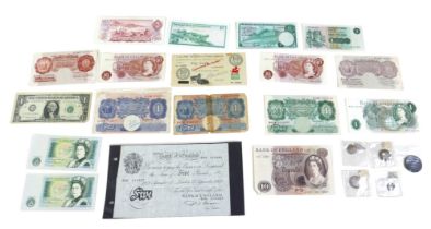 A group of notes and coins, comprising a white £5 note Beale Chief Cashier, 043 010527, dated 15th